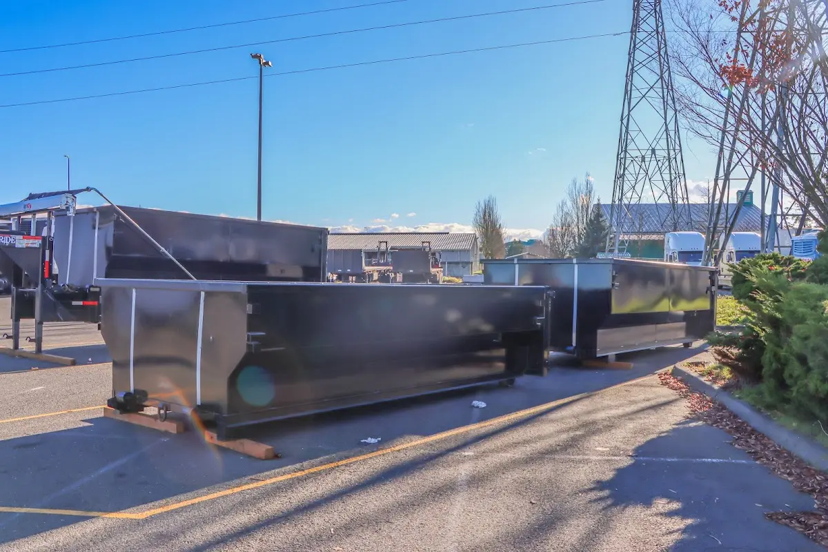 Roll-off dumpster ready for waste disposal at job site for 2 Yard Dumpster Rental in Brent